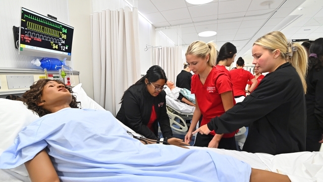 St. Johns students working in nursing lab