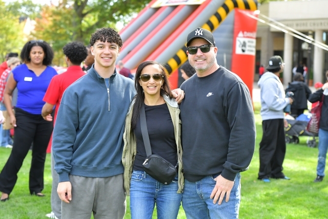 Three people on the Great Lawn