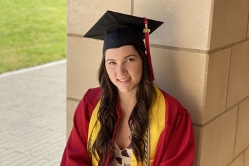 Julia Doody in her Commencement cap and gown