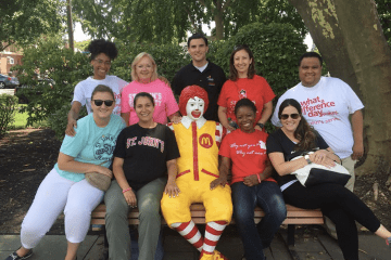 People on a bench at Ronald McDonald House