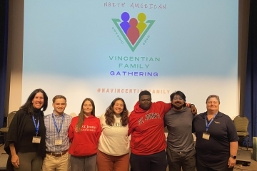 St. John's Administrators and students posing for photo at Vincentian Gathering