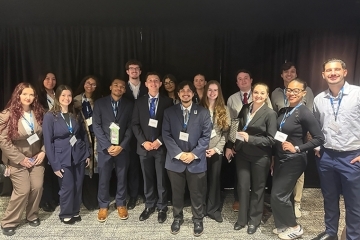 Grop of college students dressed in professional attire