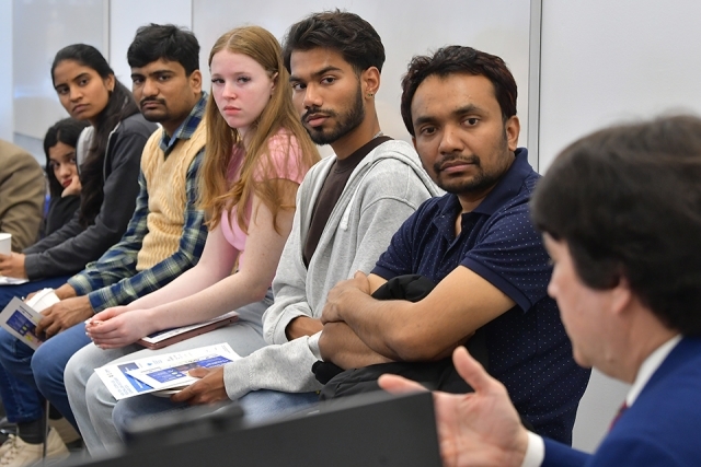 St. John's students listening to speaker in VIC series