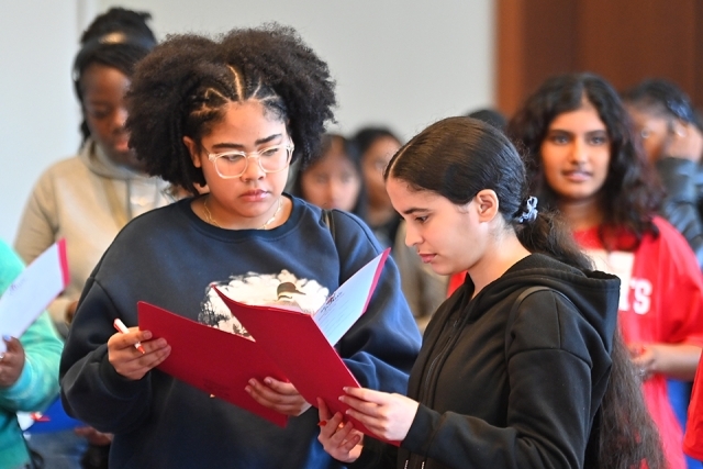 Sonia Kovalensky Day attendees reading 