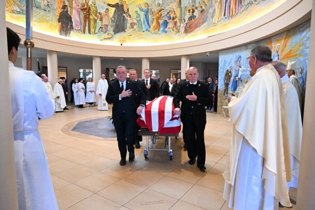 Lou Carnesecca's casket leaving St. Thomas More Church lobby 