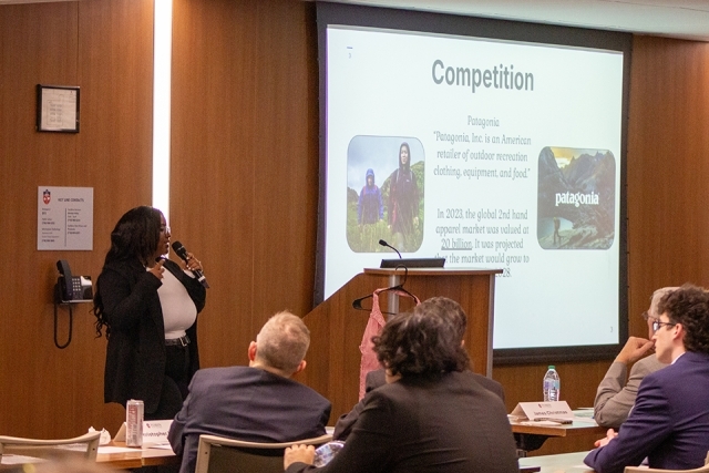 Female student presenting at Business Plan Competition