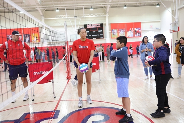 St. John's athlete with special needs students playing volleyball
