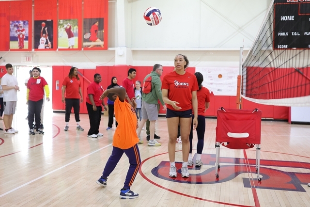 St. John's athlete with special needs students playing volleyball
