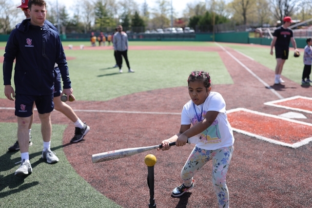 St. John's athlete with special needs students playing teeball