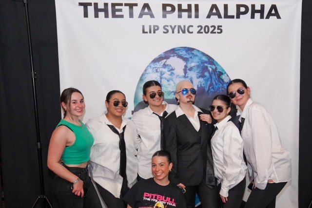 Theta Phi Alpha members at the 2025 Lip Sync event dressed as Pit Bull