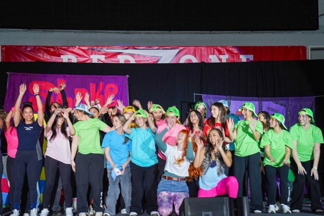 St. John's students in costume dancing at an event