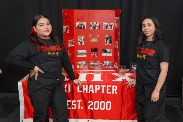 St. John's Chapter students posing for a photo at their booth