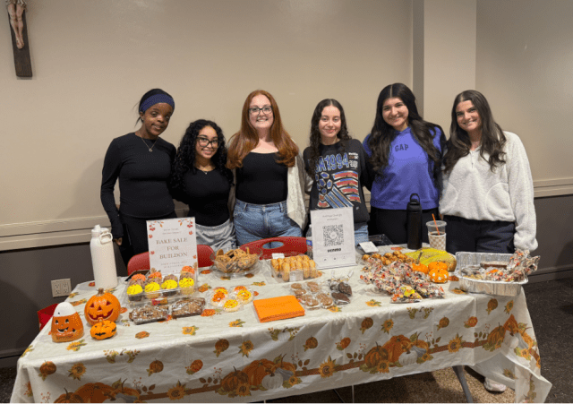 Isabella Marino, Sydney Dufour, and their team at their fundraising bake sale in Marillac.