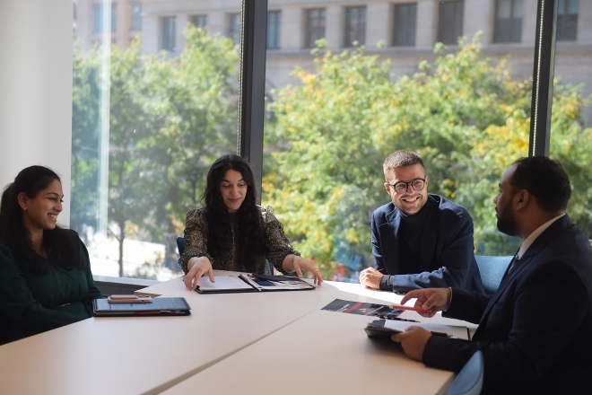 St. John's University Manhattan Campus Conference Room with Students talking at table