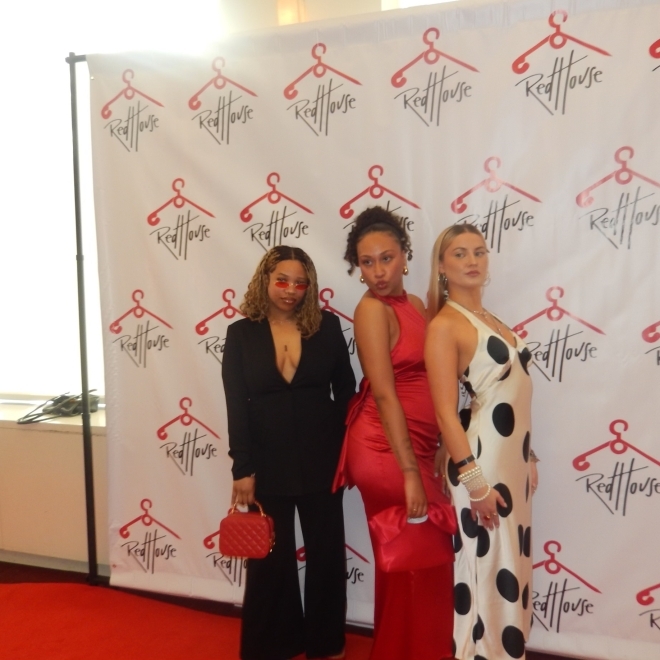 St. John's University Students dressed in gowns for a campus fashion show