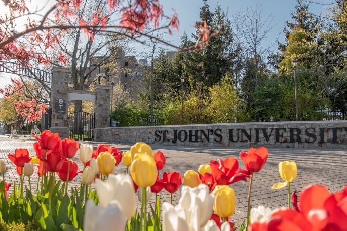 Gate 1 at St. John's with some tulips