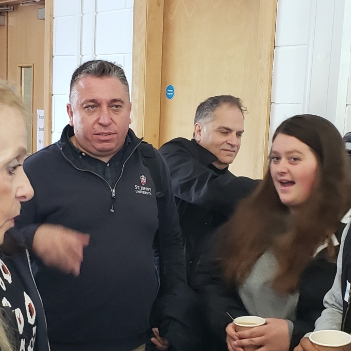 Dr. Licari of CCPS and Dir of Alumni Relations Mark Andrew's talking to SJU students in Limerick