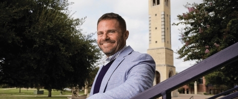 Man standing in front of building