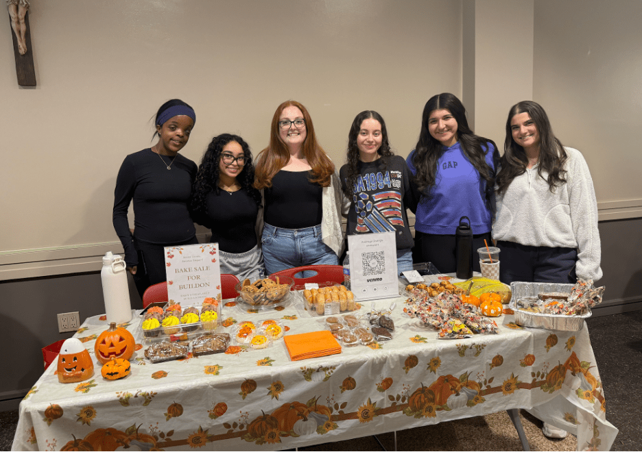 Isabella Marino, Sydney Dufour, and their team at their fundraising bake sale in Marillac.